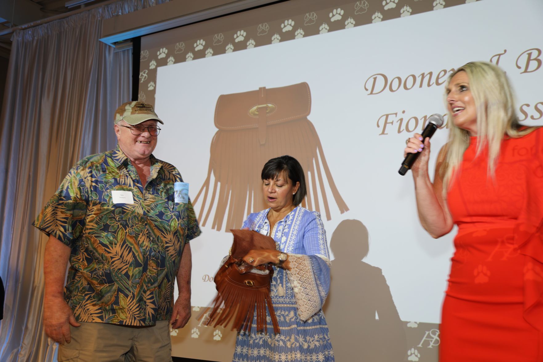Bob Howard, purse winner, Karen Kelly, MC